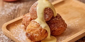 Сладкие пончики фриттеле с изюмом: рецепт итальянского дедушки