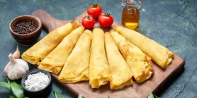 Рецепт пікантних млинців з сиром і м'ясом