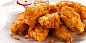 Курячі крильця в паніровці за рецептом кулінарного експерта