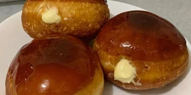 Різдвяні пончики з кремом та карамельною глазур'ю: рецепт на кефірі